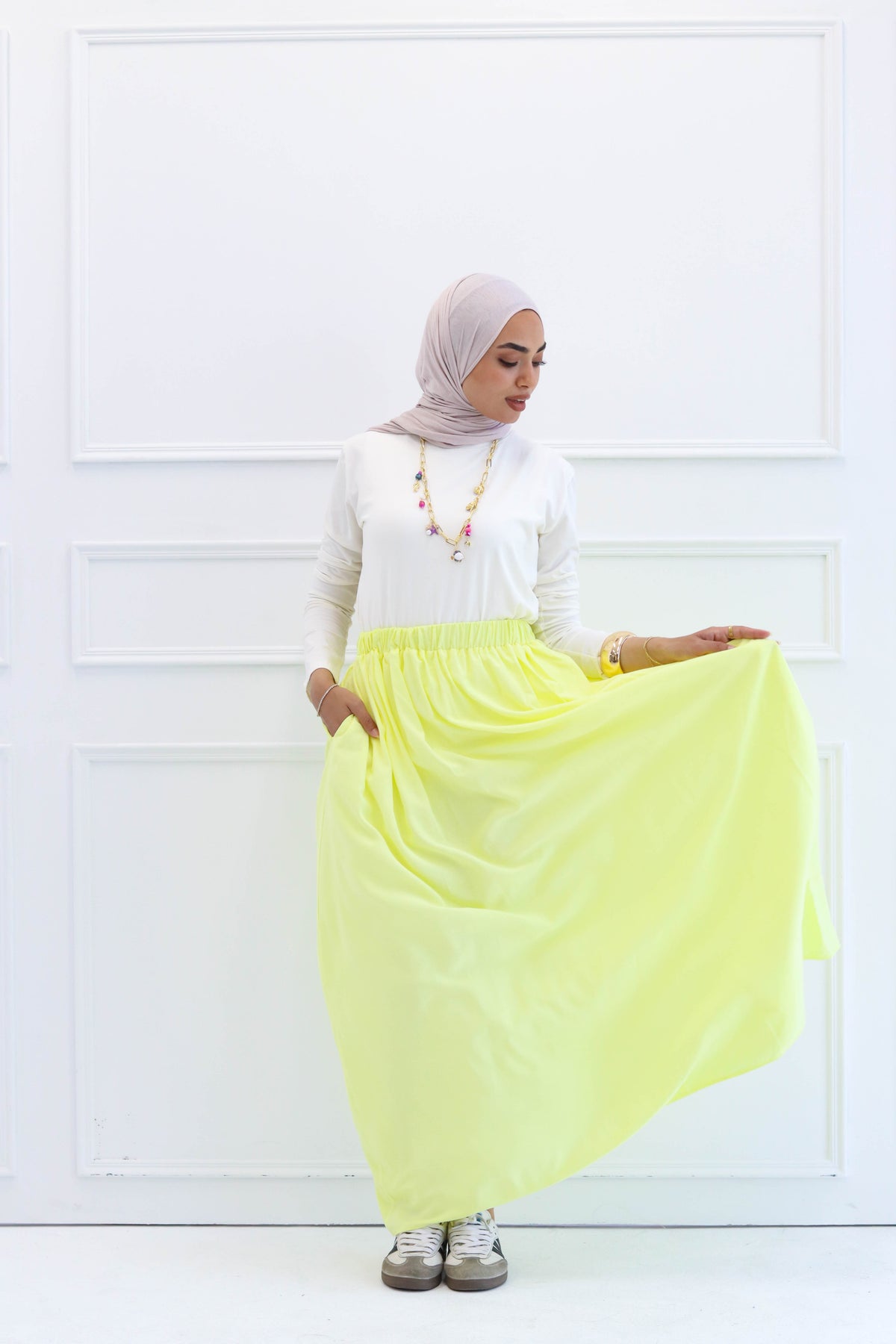 Pleated skirt in yellow